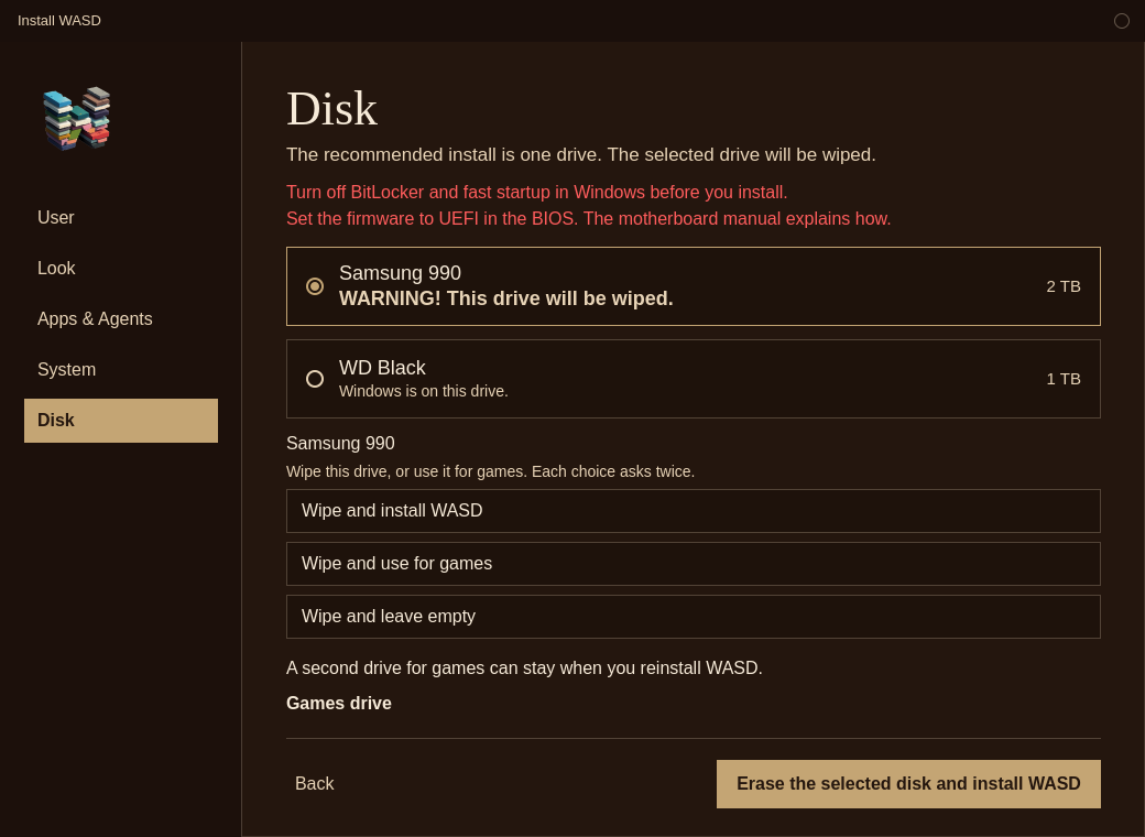 Install WASD on the Disk step. An example 2 TB drive is selected, with the warning that the drive will be wiped. Games drive is closed.